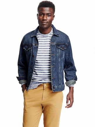 Man wearing denim jacket and striped shirt
